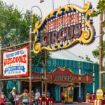 Colorful entrance to Storybook Circus in Orlando, capturing its whimsical fairground charm.