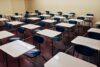 pexels-photo-256395-256395-1 An indoor view of a modern, clean classroom with rows of empty desks and chairs.